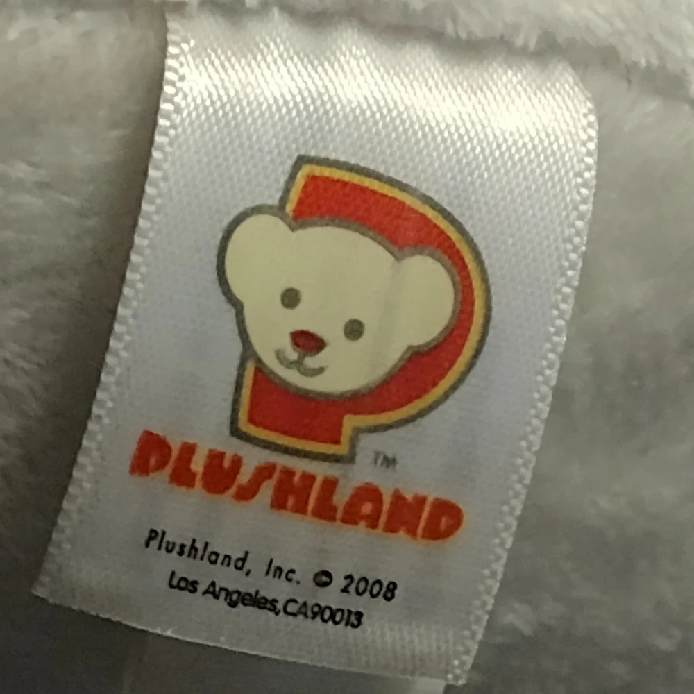 Festive Snowman Plush with Colorful Hat and Scarf - Picture 7 of 12